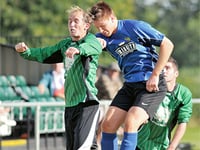 Town book match against mighty Greens