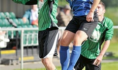 Town book match against mighty Greens