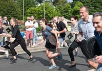 VIDEO: Ben-the-barman shakes up the waiter and waitress race at the Dartmouth Regatta