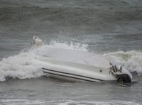 RNLI lifeguards rescue two after RIB capsizes