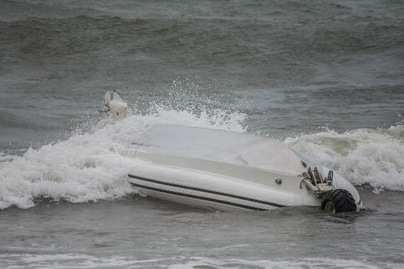 RNLI lifeguards rescue two after RIB capsizes