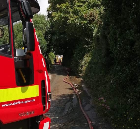 Four fire crews battle a fierce South Hams farm blaze