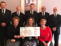Funeral directors donate £300 to cancer support through Tree of Remembrance