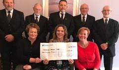Funeral directors donate £300 to cancer support through Tree of Remembrance