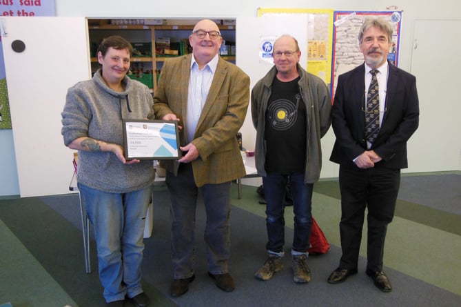 Pictured left to right are Buckfastleigh Foodbank manager Felicity Ferry, with Devonshire Freemasons Walker Lapthorn, Mike Hodgson and Reuben Ayres.
