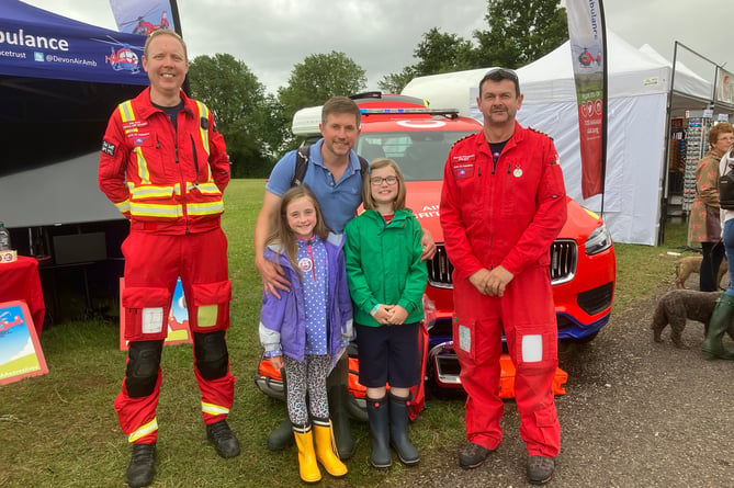 The Newport family Sophie, Megan and Dad Will were delighted to meet Devon Air Ambulance team members pilot Richard Applegarth from Holne, and critical care paramedic Paul White.
Picture Nick Knight july 2021