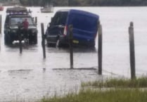 Family rescued as van comes off tidal road