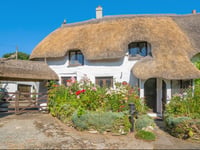 Cottage is “gardener’s delight” with fruit trees and flowers galore 