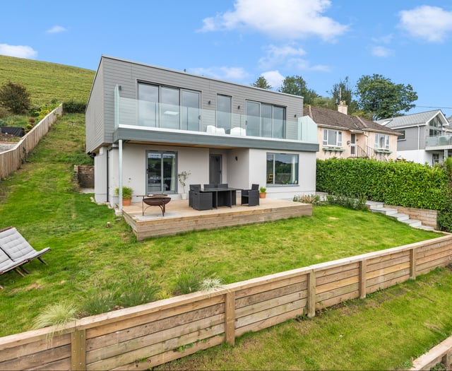 This modern home features gorgeous views and a Wi-Fi kitchen 