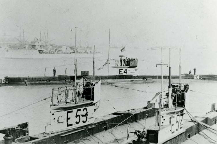 E52, the identified sumbarine in service. See SWNS story SWMRsubmarine. A naval officer is believed to have solved a 90 year mystery about a submarine buried beneath a public park.Since the 1930's, residents of Dartmouth, Devon, have been convinced that there is a wreck of a submarine buried underneath the town's park. Now, Tom Kemp, an officer from Britannia Royal Naval College which is based in Dartmouth, thinks he has finally unearthed the truth. By investigating old documents and photographs, he believes he has identified the submarine submerged underneath Coronation Park.