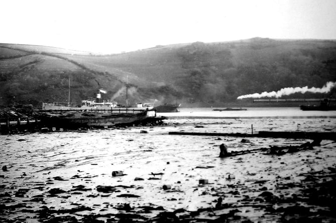 Mudflats, where the park now is, circa 1920s. See SWNS story SWMRsubmarine. A naval officer is believed to have solved a 90 year mystery about a submarine buried beneath a public park.Since the 1930's, residents of Dartmouth, Devon, have been convinced that there is a wreck of a submarine buried underneath the town's park. Now, Tom Kemp, an officer from Britannia Royal Naval College which is based in Dartmouth, thinks he has finally unearthed the truth. By investigating old documents and photographs, he believes he has identified the submarine submerged underneath Coronation Park.

