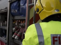 Fire crews battling blaze at yard