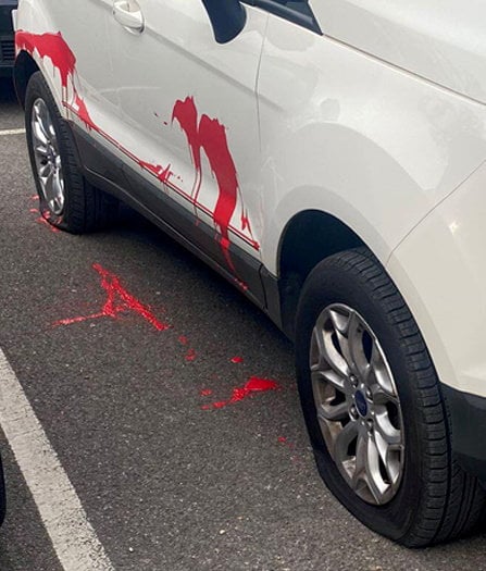 The red paint poured on the vehicle and slashed tyres. See SWNS story SWMRstalk. A stalker who drove from Devon to Sussex to slash a womans car tyres has been sentenced. Reece Chipperfield also poured red paint over the vehicle and left a threatening note on the windscreen during the 460-mile round trip. He had a professional working relationship with a former colleague at a hotel near Crawley between December 2021 and March 2022, however he quickly developed an infatuation with her.This included sending her an unwanted bracelet, contacting her work colleagues about her shift patterns without her permission and sending unwanted text messages.