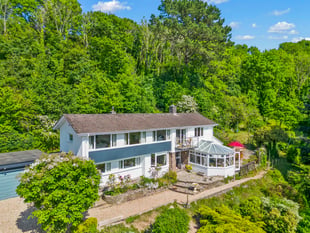 Estuary-view home for sale comes with its own woodlands and stream