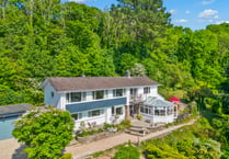 Estuary-view home for sale comes with its own woodlands and stream