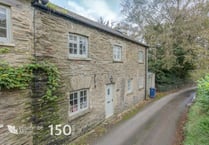 Period blacksmith's cottage for sale has "stunning" valley views 