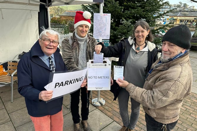 Teddy Cranmer's campaign against the parking meters in Dartmouth Town centre L to R: Teddy Cranmer, Charlie Pritchard-Williams, Cllr Mandy Webber and Cllr Mike Rowley