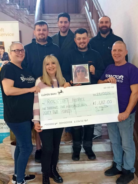 The Ash family presenting the cheque to Rowcroft Hospice