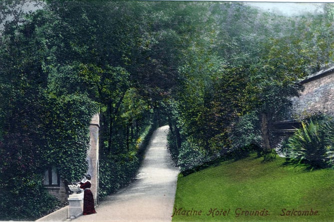 1900 (circa)  grounds of Marine Hotel, Cliff Road, Salcombe, with woman by folly.  Folly still remains. Marine Hotel, now Salcombe Harbour Hotel, was built in 1839 as a private residence called Ringrone, by Lord Kingsale, and became an hotel in 1880.