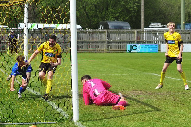 South Devon League football. Dartmouth Cup action from Buckland Athletic 2nds versus Paignton Saints 1st. A 2-1 win for Buckland. Buck's second goal