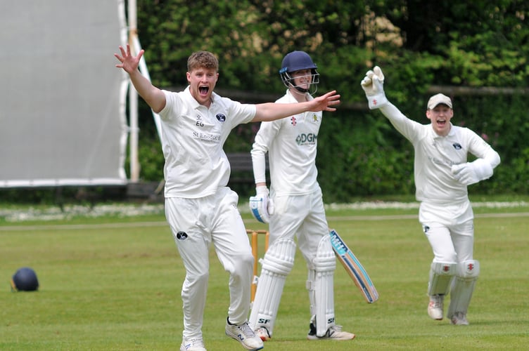 Devon Cricket LeagueA Division.   Abbotskerswell versus Bridestowe. Bridestowe bowler  Etahn Guest and 'keeper Patrick Ewen are vocal in their appeal for lbw - but Abbotskerwell batsman James Tyler is safe for now