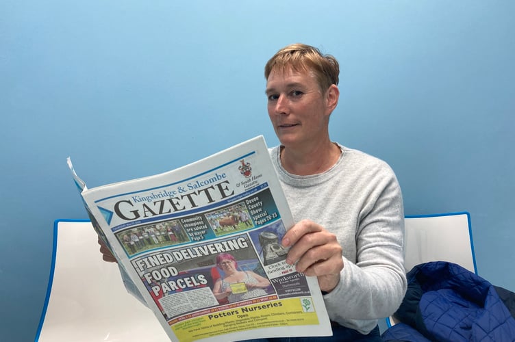 Julia reads the Gazette