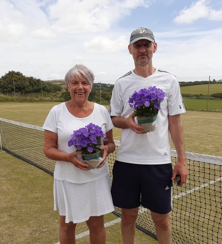 Julie Hanham and Roger Tweedale with their Wimbledon coloured plants
