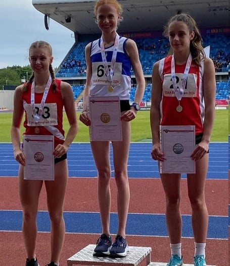 Olivia Steer on the podium in second