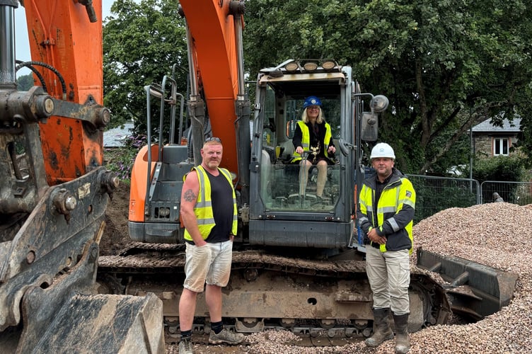 From left: From left: Wayne Brown Regional Manager CAMC, Cllr Emily Price, Mayor of Totnes and Nick Gower Site Foreman Barratt and Canniford.