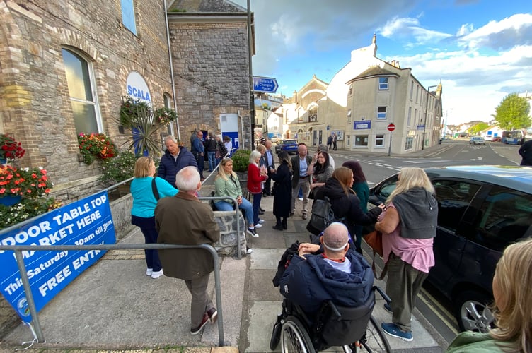 Members of the public waiting to enter the Scala Hall in Brixham, where South West Water hosted the event 