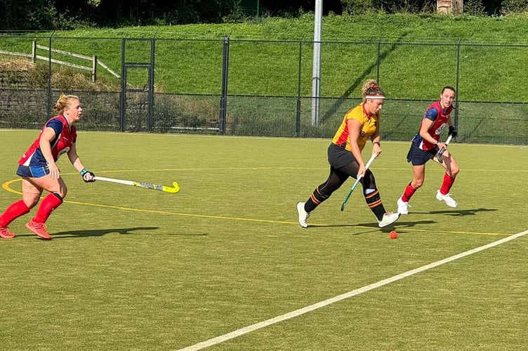 Kingsbridge & Salcombe HC duo Rachel Booton and Hannah Cox in action