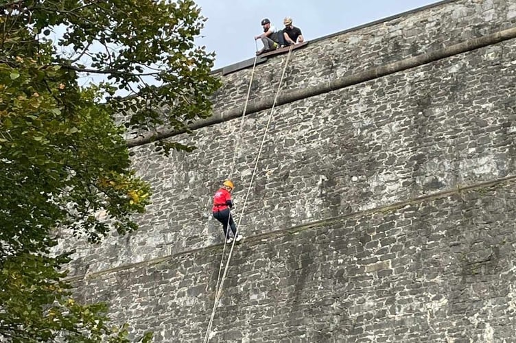 SW Devon MP Rebecca Smith abseils down Plymouth Citadel in aid of Devon Air Ambulance which helped her friend
