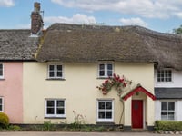 Period cottage for sale overlooking stream is full of "timeless charm"