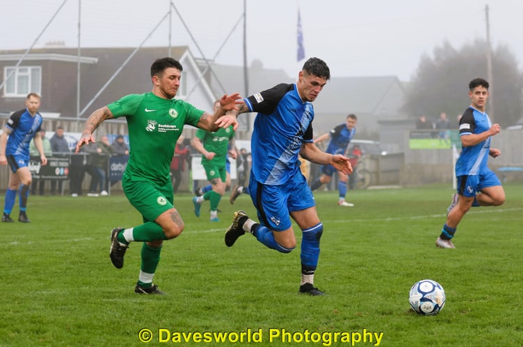 Ivybridge Town vs Brixham AFC action