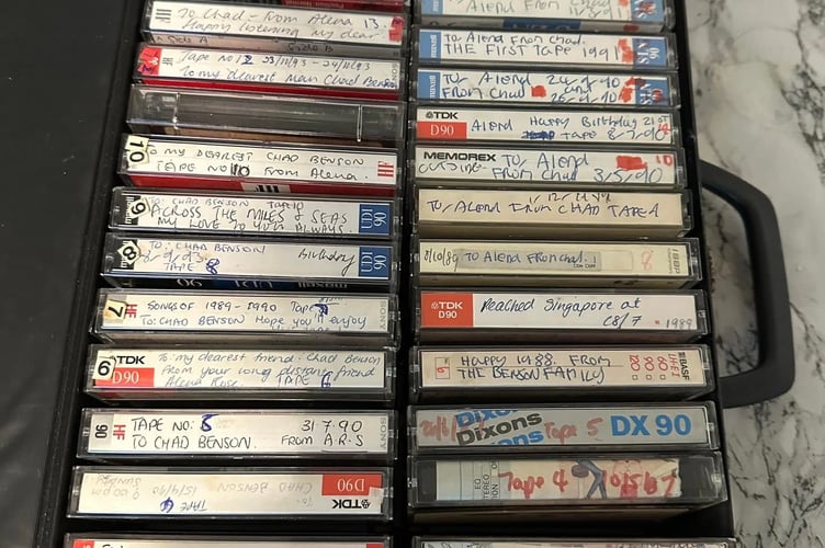 The cassettes exchanged between the couple. Photo released December 20 2024. A couple who met when they became pen pals as kids 7,000 miles apart are celebrating 30 years of marriage. Alena and Chad Benson first wrote to each other in 1986 - with no idea it would blossom into a life-long love story.Alena, from Singapore, then aged 17, initiated the exchange, writing to several people overseas - including Chad from Plymouth in Devon.Their letters continued through the 1980s and they also started exchanging cassette tapes of each other chatting - with more than 100 tapes sent between them.