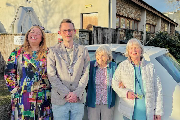 L to R: Kate Walker from Totnes Caring with Cllr Tim Bennett, Deputy Mayor of Totnes, Elizabeth Gorden, one of Totnes Caring’s clients who uses the transport service, and Mandy Flannery, one of Totnes Caring’s volunteer drivers.