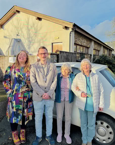 L to R: Kate Walker from Totnes Caring with Cllr Tim Bennett, Deputy Mayor of Totnes, Elizabeth Gorden, one of Totnes Caring’s clients who uses the transport service, and Mandy Flannery, one of Totnes Caring’s volunteer drivers.