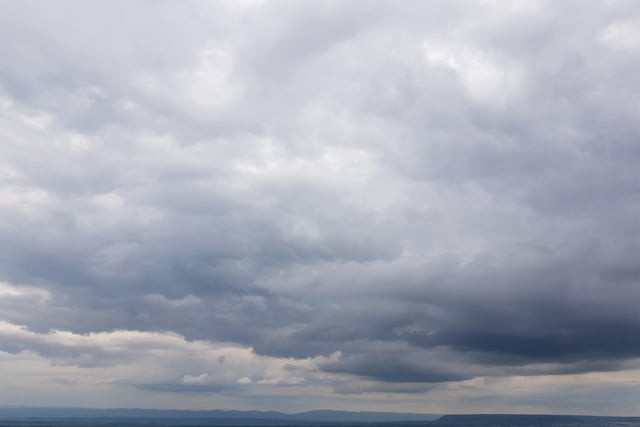 Clouds today with patchy rain likely tomorrow