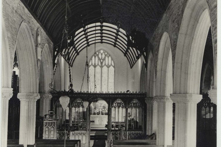 Black & white postcard. Interior of St Michael and All Angels Church, Stokenham