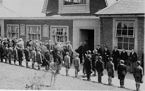 The 1931 opening of Kingsley Road School, Westville, Kingsbridge with boys lined up for inspection
