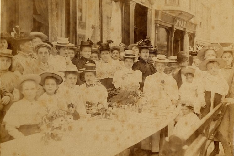 1897 Diamond Jubilee celebrations. Street party, Fore Street, Kingsbridge, with young girls and women in best dress. Port's shoemakers shop on the right of the picture