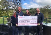 Dartmouth Golf Club delivers Hearts Together cheque