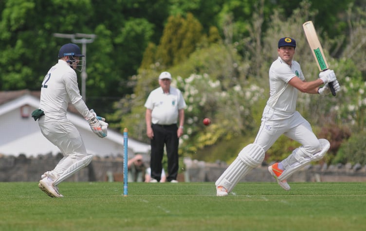 Devon Cricket League B Division. Bovey Tracey 2nd XI versus Ivybridge 1st XI. Ivybridge opener Josh Zimmerman and Bovey 'keeper Joseph Forey