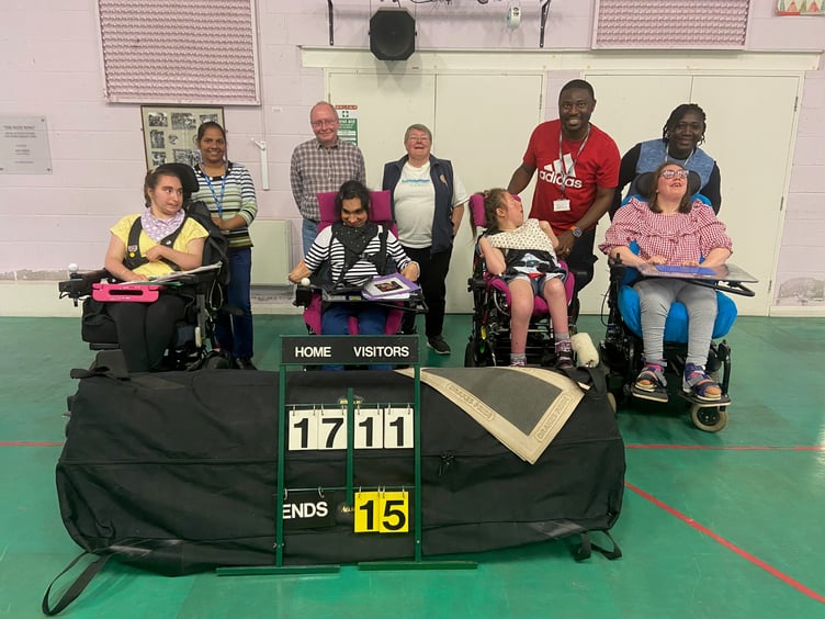 Neil Cook and Veronika Haydon-Foster with the young people at Dame Hannahs