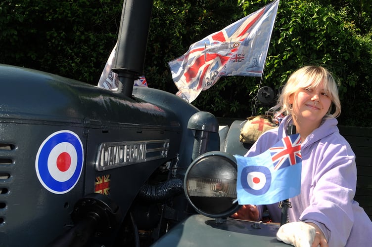 Devon County Show . A final polish from Megan Fowler for this vintage 1944 David Brown tractor resplendent in wartime RAF livery . The vehicle, owned by her dad Tony Fowler, would have been a common sight on airfields in WW2 towing everything from aircraft to bomb trolleys