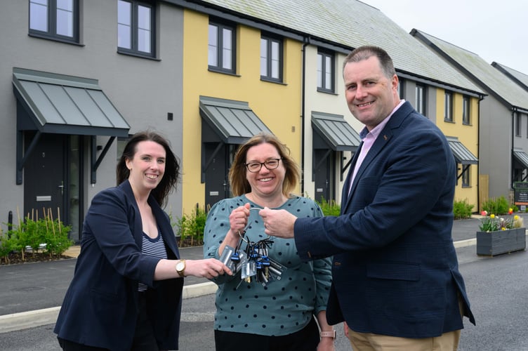 25.04.25 Dartington
Handing over the keys at a presentation to two members of staff of the Sovereign Housing Association was the Deputy Managing Director of Baker Estates Ltd, Graham Hutton at the St Maryâs estate in Dartington on Friday 25th April 2025.