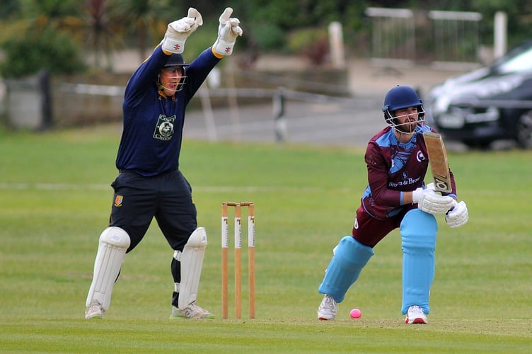 Devon Cricket League A Division. Torquay and Kingskerswell versus Tavistock. Tavi 'keeper Dave Manning appeals for lbw - and Torquay and Kingskerswell's Harry Baxendale leaves the crease