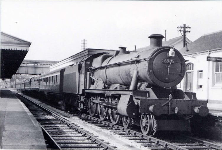 Engine number 6965 'Thirlestaine Hall' with a train from Kingswear at Paignton 1960