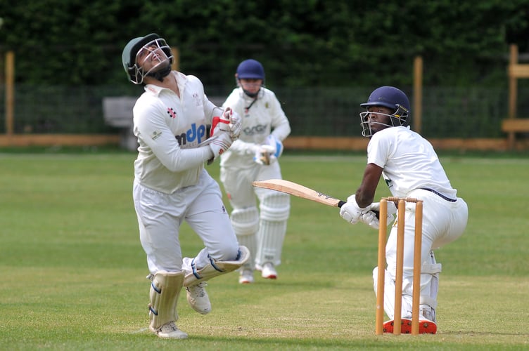 Devon Cricket League B Division. Abbotskerswell versus Stoke Gabriel. Stoke 'keeper Abhishek Anand and Abbots' batsman Harrison Vickery . A one wicket win for Stoke with a final score of Abbotskerswell on 176/8 after 45 overs and Stoke Gabriel making 177/9 in 28.4 overs