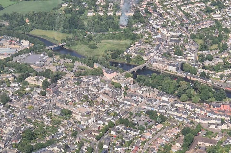 Distant drone shot showing location of fire Ph: Ashby's Leisure stores